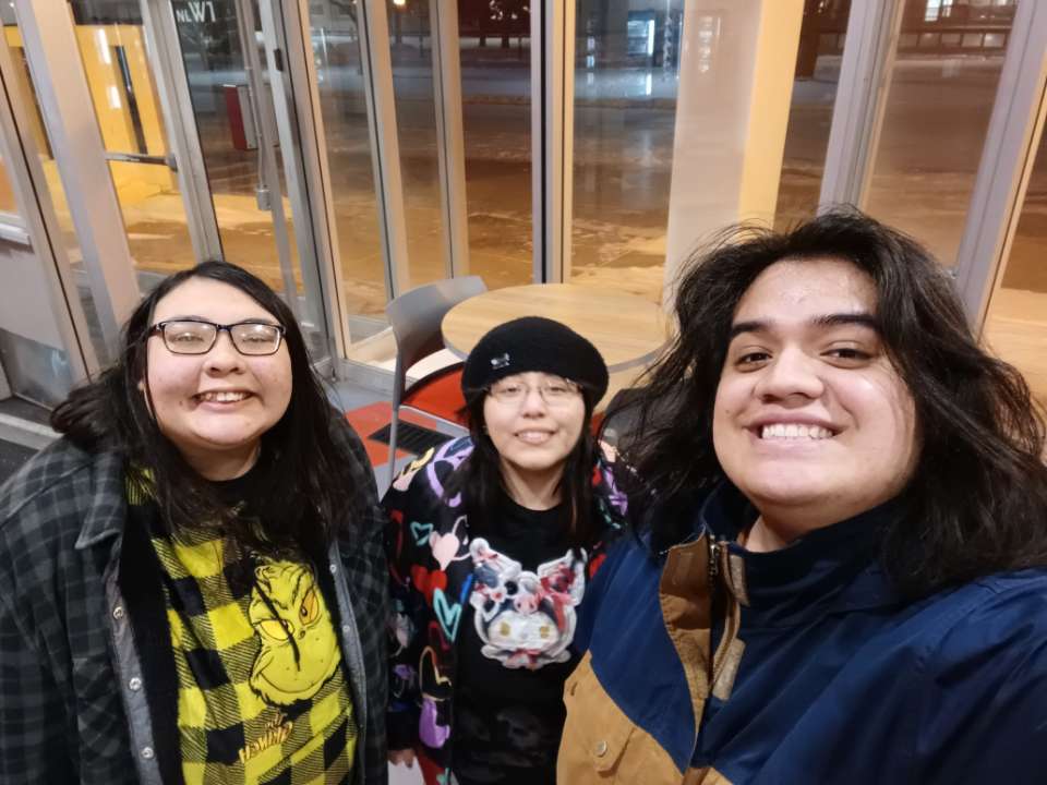 A picture of Elie, Cynthia, and Judah