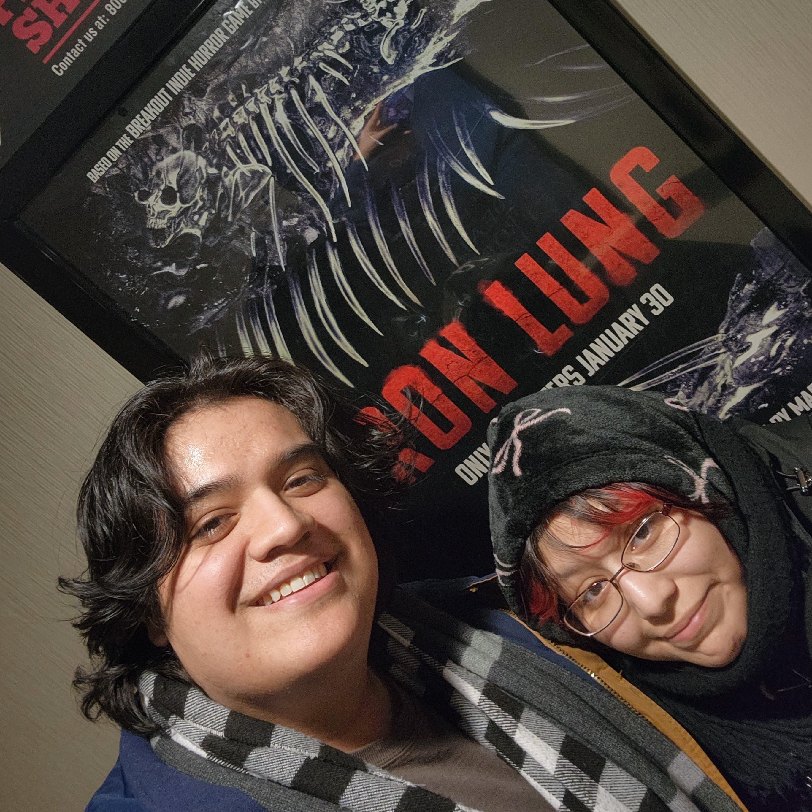 Couples picture of Judah and Cynthia looking up at the camera.