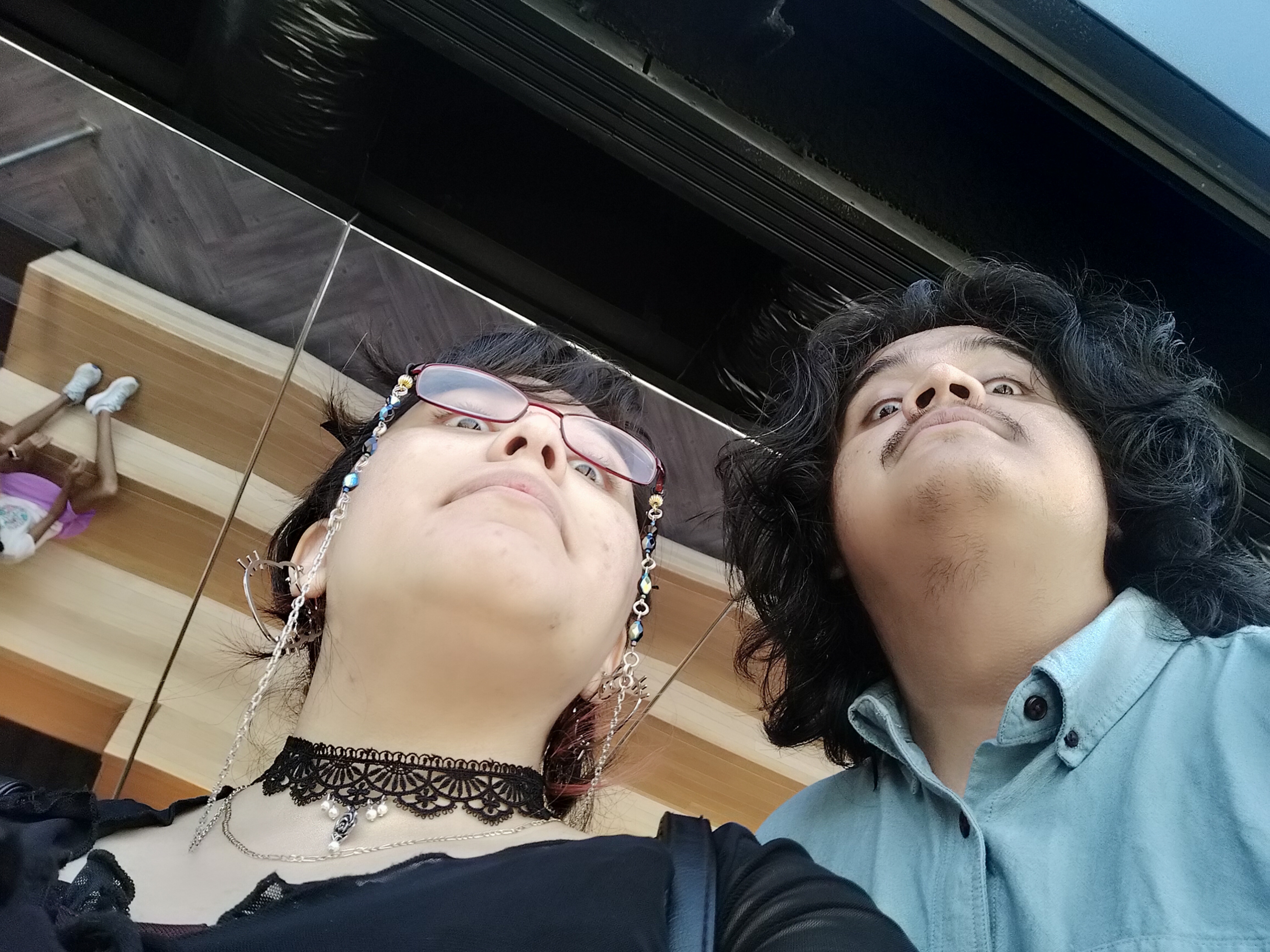 Couples picture of Judah and Cynthia looking up at the camera.